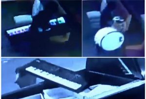 burglar stealing digital piano, drum from church