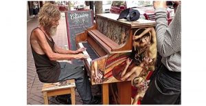 homeless man beautifully plays the piano